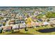 Wide aerial view showcasing the home's setting and neighborhood at 24588 Buckingham Way, Port Charlotte, FL 33980