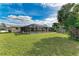 Large backyard with pool, shed, and lush lawn at 258 Shadow Nw St, Port Charlotte, FL 33952
