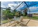 Covered patio area overlooking the pool at 258 Shadow Nw St, Port Charlotte, FL 33952
