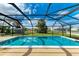 Relaxing screened pool area with backyard view at 258 Shadow Nw St, Port Charlotte, FL 33952