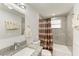 Clean bathroom with granite countertop and tub shower at 258 Shadow Nw St, Port Charlotte, FL 33952