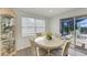 Bright dining area with table and chairs, view of backyard at 258 Shadow Nw St, Port Charlotte, FL 33952
