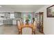 Bright dining room with wooden table and pool view at 258 Shadow Nw St, Port Charlotte, FL 33952