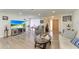 Spacious living area with large TV and hardwood floors at 258 Shadow Nw St, Port Charlotte, FL 33952