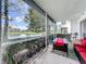 Relaxing screened patio overlooking a pond at 6568 Fairway Gardens Dr, Bradenton, FL 34203