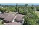 Units feature charming outdoor spaces and are surrounded by beautiful tropical foliage at 1001 W Marion Ave # 14, Punta Gorda, FL 33950