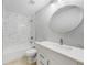 Bathroom featuring a shower and tub combination with updated hardware and bright lighting at 1001 W Marion Ave # 14, Punta Gorda, FL 33950