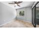 This bedroom has tile flooring and lots of natural light streaming in from the window at 1001 W Marion Ave # 14, Punta Gorda, FL 33950