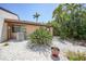 Charming single-story home featuring desert landscaping and a neutral exterior paint scheme on a sunny day at 1001 W Marion Ave # 14, Punta Gorda, FL 33950