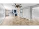 Open floor plan featuring the living room with the kitchen in the back and closet storage at 1001 W Marion Ave # 14, Punta Gorda, FL 33950