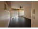 Living room with a fan, a sliding glass door, and neutral-colored walls at 269 Rosemary St, Port Charlotte, FL 33954