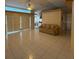 Spacious living room with tile flooring and a comfortable couch at 269 Rosemary St, Port Charlotte, FL 33954