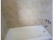 Clean bathtub with neutral-toned tile surround at 3100 Harbor Blvd # 116, Port Charlotte, FL 33952