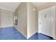 Condominium front entrance with white door, unit number 116, and view of the window at 3100 Harbor Blvd # 116, Port Charlotte, FL 33952