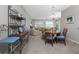 Bright dining area with wood table and chairs at 255 W End Dr # 3211, Punta Gorda, FL 33950