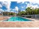 Inviting pool area with lounge chairs and a beautiful view at 255 W End Dr # 3211, Punta Gorda, FL 33950