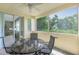 Private patio with table and chairs, perfect for outdoor dining at 255 W End Dr # 3211, Punta Gorda, FL 33950
