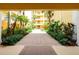 Brick courtyard with fountain and tropical landscaping at 255 W End Dr # 3211, Punta Gorda, FL 33950