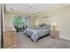 Spacious bedroom with a king-size bed and private balcony access at 255 W End Dr # 3211, Punta Gorda, FL 33950