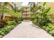 Shared courtyard with lush landscaping and a central fountain at 255 W End Dr # 3211, Punta Gorda, FL 33950
