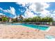 Inviting pool area with lounge chairs and a beautiful view at 255 W End Dr # 3211, Punta Gorda, FL 33950
