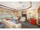 Relaxing lounge with comfortable seating and a fireplace at 255 W End Dr # 3211, Punta Gorda, FL 33950