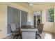 Relaxing patio featuring a glass-top table and comfortable seating at 255 W End Dr # 3211, Punta Gorda, FL 33950