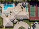 Community pool, tennis courts, and clubhouse at 255 W End Dr # 3211, Punta Gorda, FL 33950