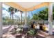 Outdoor kitchen with grill and seating area at 255 W End Dr # 3211, Punta Gorda, FL 33950