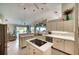 Eat-in kitchen with island and stainless steel appliances at 7369 Schefflera, Punta Gorda, FL 33955