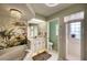 Spa-like bathroom with a soaking tub, walk-in shower, and updated vanity at 7369 Schefflera, Punta Gorda, FL 33955