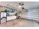 Spacious garage with storage cabinets and overhead storage at 7369 Schefflera, Punta Gorda, FL 33955