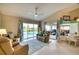 Relaxing living room with sliding doors to the pool area at 7369 Schefflera, Punta Gorda, FL 33955