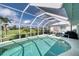 Enjoy this large screened in pool and patio area at 7369 Schefflera, Punta Gorda, FL 33955