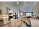 Updated kitchen boasts stainless steel appliances and an island at 7369 Schefflera, Punta Gorda, FL 33955