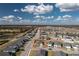 An aerial view of a house with a surrounding neighborhood visible at 16844 Lazzo Dr, Port Charlotte, FL 33953