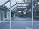 Enclosed pool area with a screened enclosure at 269 Rosemary St, Port Charlotte, FL 33954