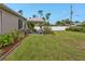 Large backyard with patio and lush landscaping at 17440 Marcy Ave, Port Charlotte, FL 33948