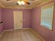 Bedroom with purple walls and tile floors at 512 Chamber Nw St, Port Charlotte, FL 33948