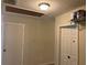 Hallway with attic access and extra storage at 512 Chamber Nw St, Port Charlotte, FL 33948