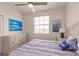 Bedroom with a queen bed, dresser, and window with blinds at 14131 Heritage Landing Blvd # 838, Punta Gorda, FL 33955