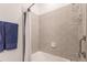 Clean bathroom with a shower/tub combo and neutral tile at 14131 Heritage Landing Blvd # 838, Punta Gorda, FL 33955
