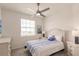 Guest bedroom with a queen bed, nightstands, and dresser at 14131 Heritage Landing Blvd # 838, Punta Gorda, FL 33955