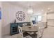 Open concept dining area with kitchen views and a round table at 14131 Heritage Landing Blvd # 838, Punta Gorda, FL 33955