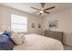 King-size bed in a relaxing main bedroom with a dresser and artwork at 14131 Heritage Landing Blvd # 838, Punta Gorda, FL 33955