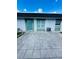 Private patio area with concrete pavers in front of the unit at 7739 38Th N Pl, St Petersburg, FL 33709