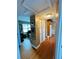 Hallway connecting living areas and kitchen at 7739 38Th N Pl, St Petersburg, FL 33709