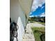 View of the exterior of the property, showing the backyard and neighboring buildings at 7739 38Th N Pl, St Petersburg, FL 33709