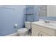 Small bathroom with toilet, sink, and built-in shelving at 255 W End Dr # 2201, Punta Gorda, FL 33950
