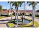 Resort-style community clubhouse with circular driveway and fountain at 255 W End Dr # 2201, Punta Gorda, FL 33950